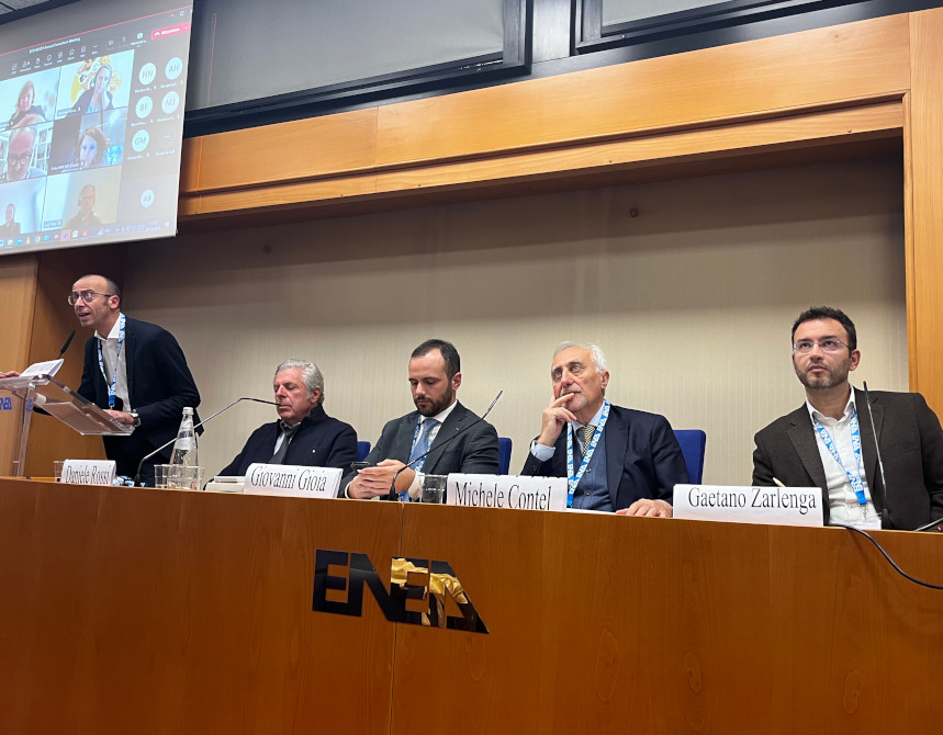 group of speakers at the desk